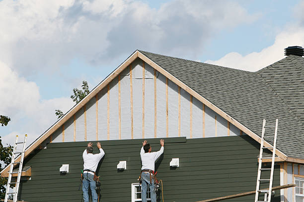 Professional Siding Repair technician working in Clarksburg, MD